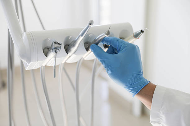 Professional Tooth Extraction technician working in McEwen, TN